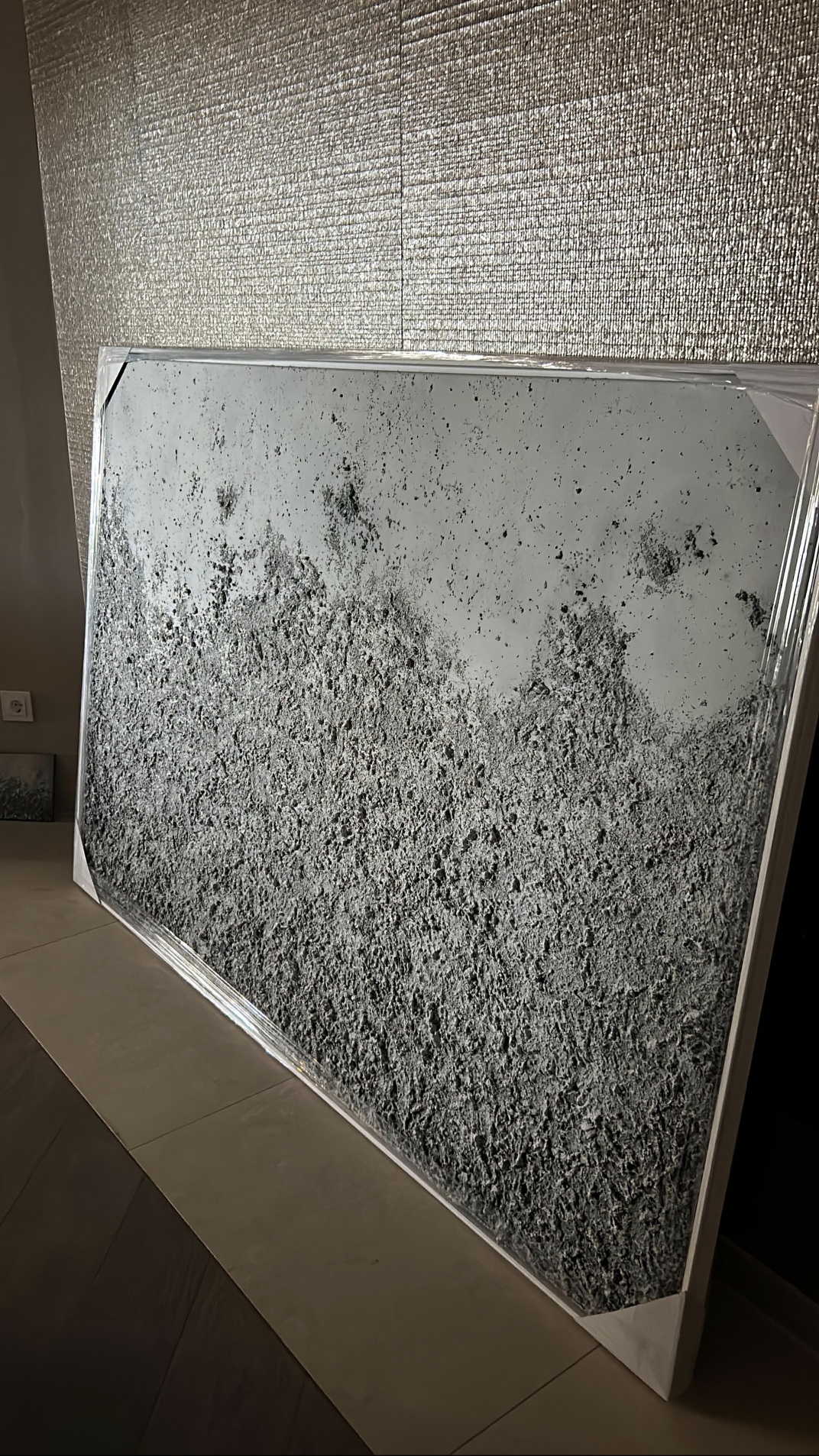 Large textured acrylic artwork by Mallorca-based artist Janis Baer in interior setting